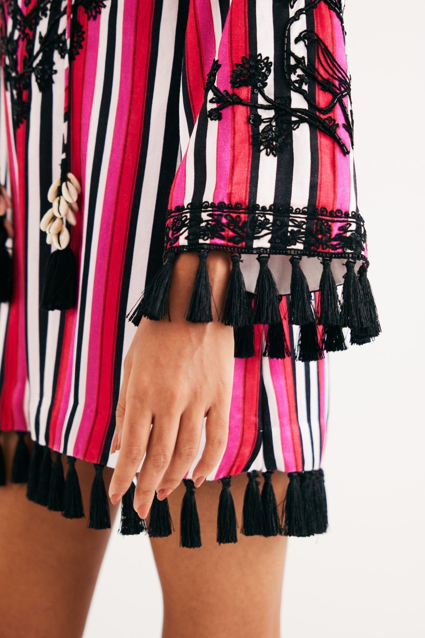Rani pink Stripe Mashroo Satin Embroidered Tunic and Black Narrow Pants, Black Silk Velvet Narrow Pants, Mashru cotton satin fabric, Flared sleeves with tassels Hand embroidered with sequins, Tassle at sleeves, BeTrue, Be True